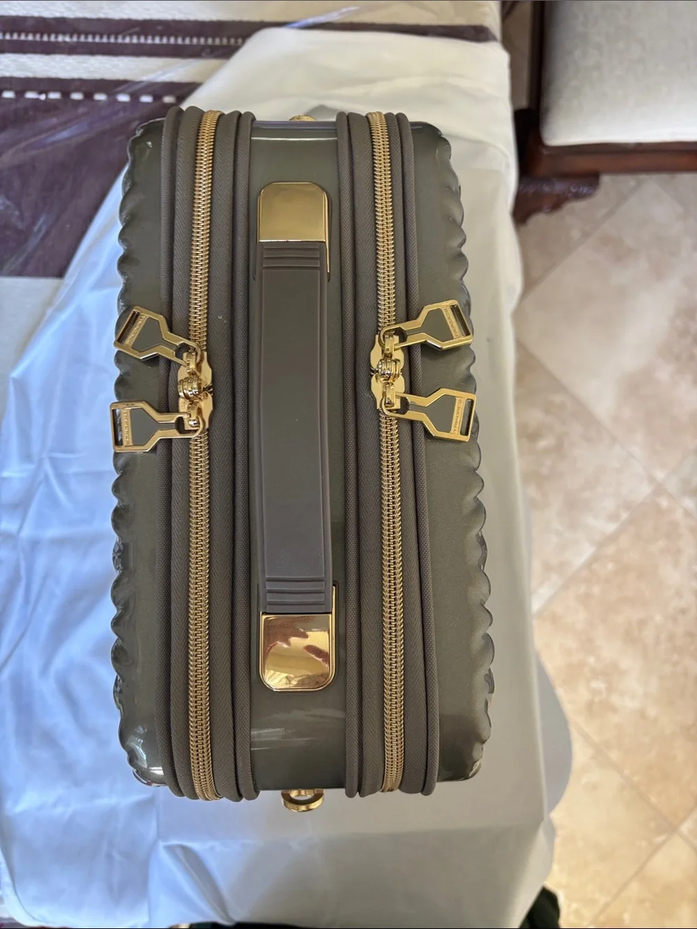 Metallic Gray Quilted Cosmetic Case with Gold Accents